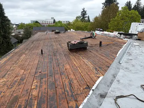 Stripped low-slope roof deck before membrane installation