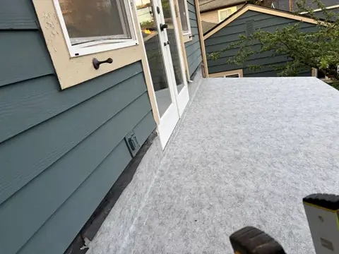 Finished light-colored waterproof surface on a small flat roof