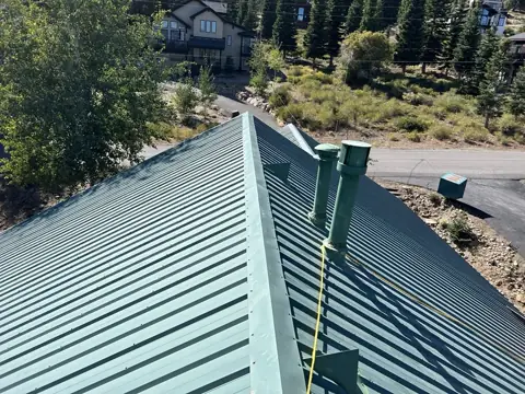 Green metal roof before roof painting